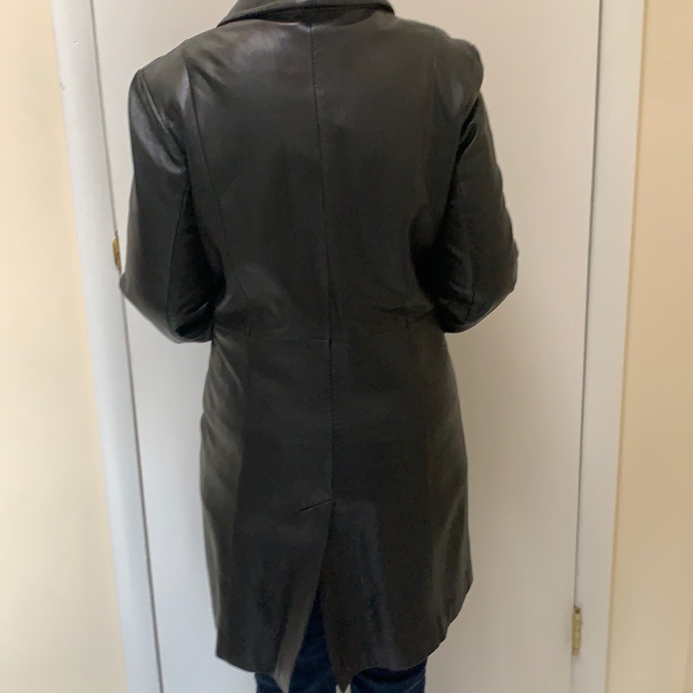 This is a black leather trenchcoat in very good condition.